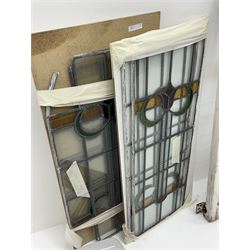 Collection of stained and leaded glass windows and panes, stylised floral design, various sizes, the largest window measuring 55cm x 112cm (including wooden frame)