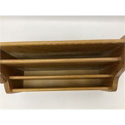 Mouseman - oak letter rack, shaped end supports enclosing three divisions, carved with mouse signature, by the workshop of Robert Thompson, Kilburn