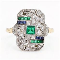 Art Deco 18ct diamond, emerald and sapphire panel ring, the rectangular floral pierced pan...
