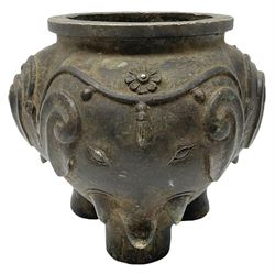 Chinese Qing dynasty bronze elephant censer, of tripod form, the lobed body cast as the heads of three elephants with floral trappings, upon three legs modelled as elephant feet, H12cm rim D9.5cm