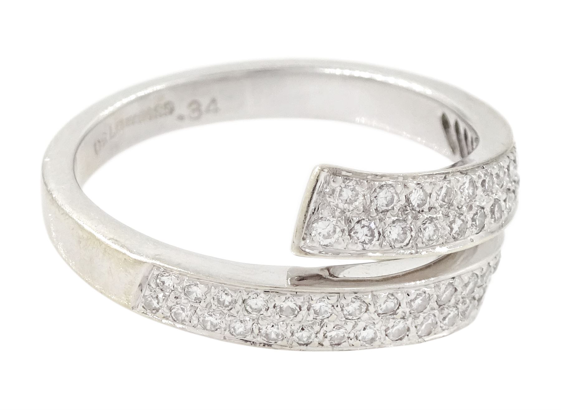 18t white gold diamond crossover ring, two rows of pave set round brilliant cut diamonds, hallmarked, total diamond weight 0.34 carat