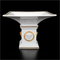 Rosenthal Versace Gorgona pedestal dish, of square form, decorated in relief with Medusa m...