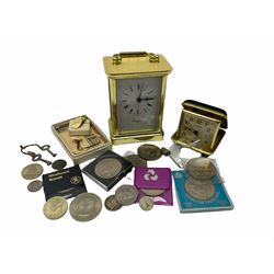 Small quantity of coins, to include Commemorative Crowns, two 1986 two pound coins, Queen Victorian 1896 shilling, etc., together with a carriage clock, and travel clock, in one box