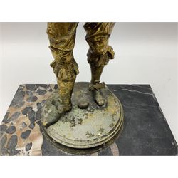 Pair of Cavaliers stood upon black marble bases, the composite figures decorated with gilding, H49cm