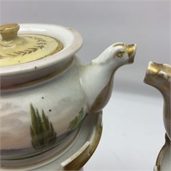 Two 19th century continental teapots and warmers, each teapot upon a cylindrical warming base, hand printed with landscapes and seascapes, largest H22cm