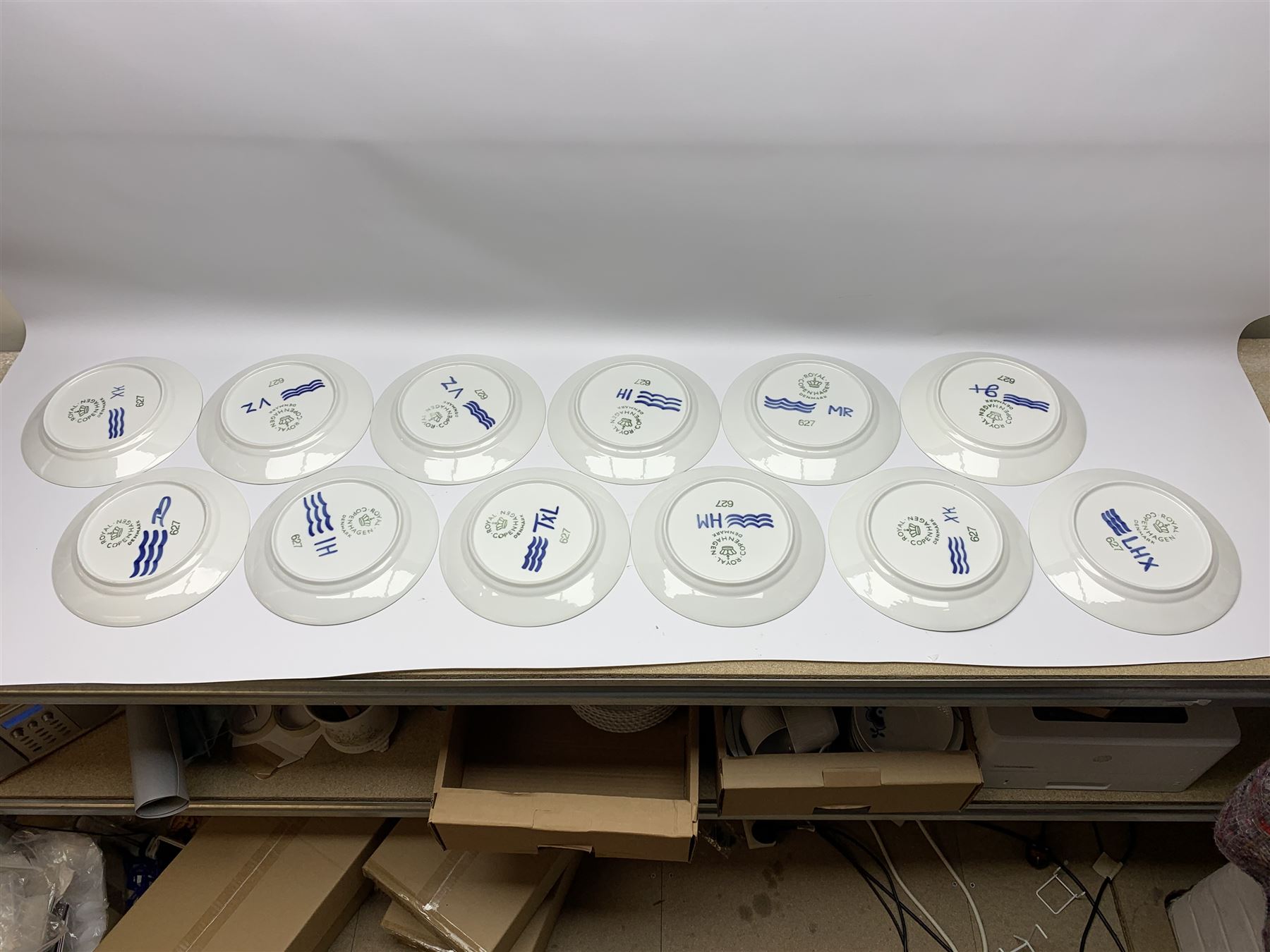 Royal Copenhagen tea and dinner service for twelve place settings, decorated in the Mega Blue Fluted pattern, pattern number 622, comprising dinner plates, salad plates, bowls with pierced rim, smaller bowls, tea cups, and saucers, dinner plates D27.5cm, salad plates D22cm