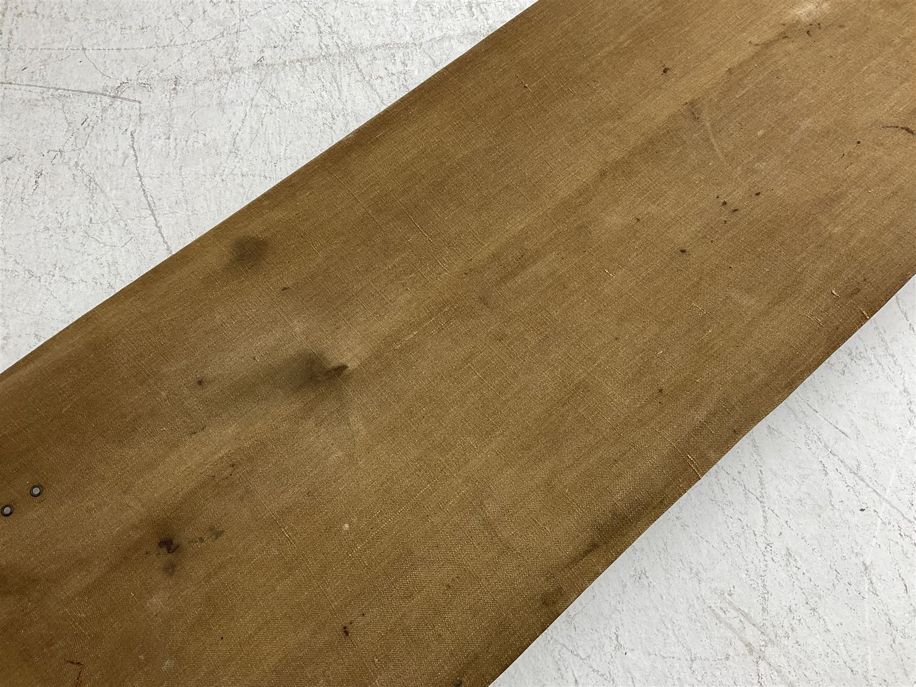 WW1 British casualty stretcher with iron mounted pitch pine sides and canvas base; stamped 'HL1917' and L7 with broad arrow in a triangle L236cm ( reputedly recovered from a barn at Bapaume on The Somme)