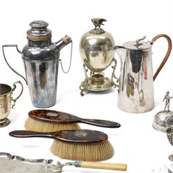 Silver plated egg boiler with bird finial, plated cocktail shaker, plated table bell, pair of tortoiseshell brushes' plated dessert knives and forks and other items 