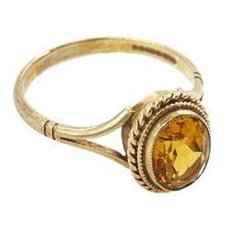 9ct gold oval citrine ring with rope twist surround, Birmingham 1983