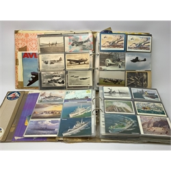 Two albums containing over one thousand postcards of aircraft, aviation and naval interest including real photographic and printed studies of aeroplanes and ships including military and commercial aircraft in flight, on the ground and under construction, naval warships at sea and under fire etc. From the collection of the late Leslie Benson (2)