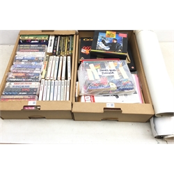  Collection of James Bond 007 memorabilia incl. Coronet and Pan paperbacks, other Bond books, On Her Majesty's Secret Service, Goldeneye and Tomorrow Never Dies boxed videos, fan club magazines, Junior Bond cards, film posters etc, in two boxes  