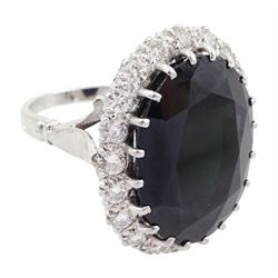18ct white gold large oval sapphire and round brilliant cut diamond cluster ring, sapphire approx 27.35 carat, total diamond weight approx 1.00 carat