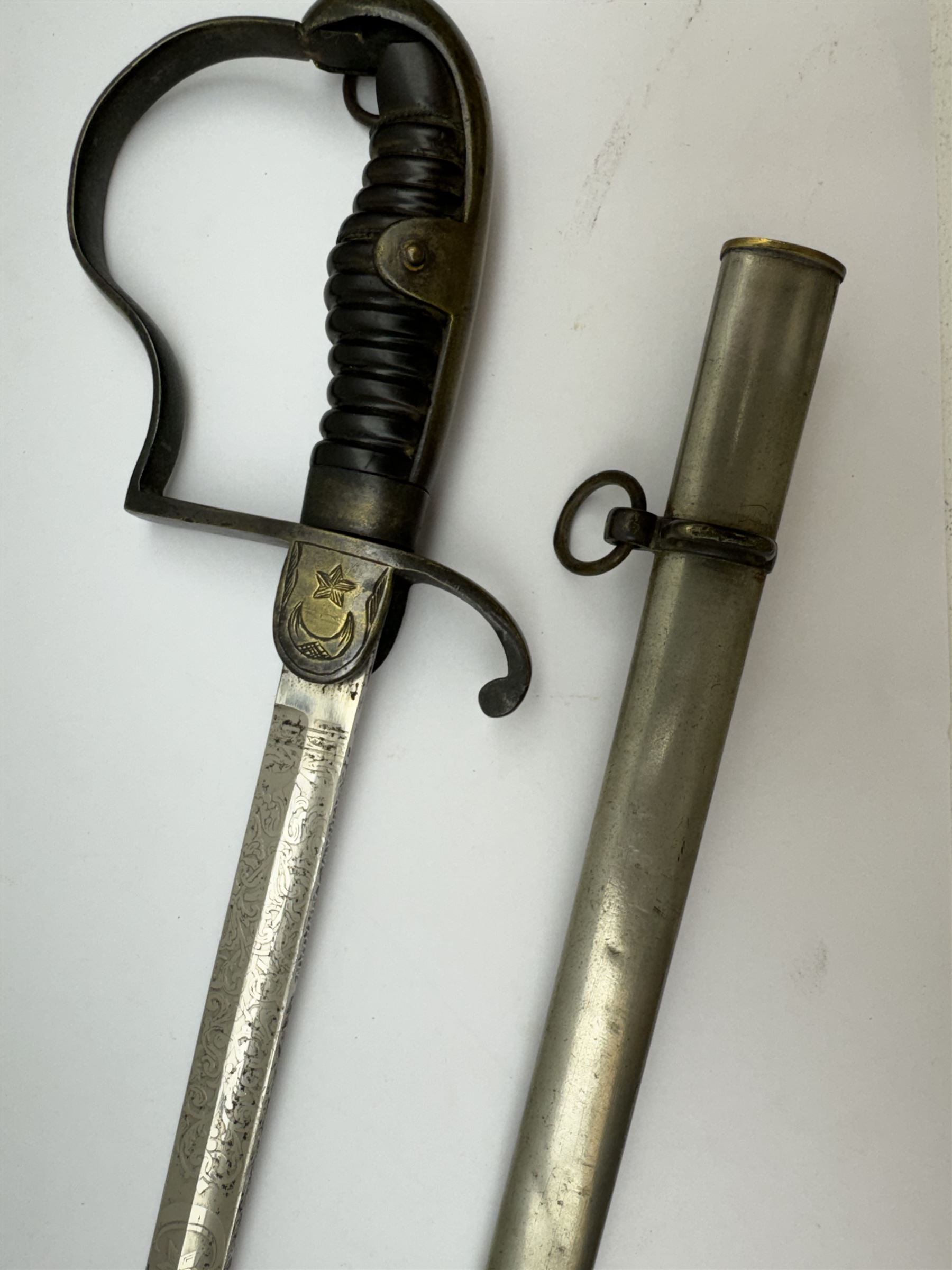 Ottoman/Turkish WW1 Period Infantry Officer's Short Sword,  the single edge fullered steel blade etched with a martial trophy, star and crescent, L73cm, the rib etched Vahram Tagirian, with steel scabbard, L87cm