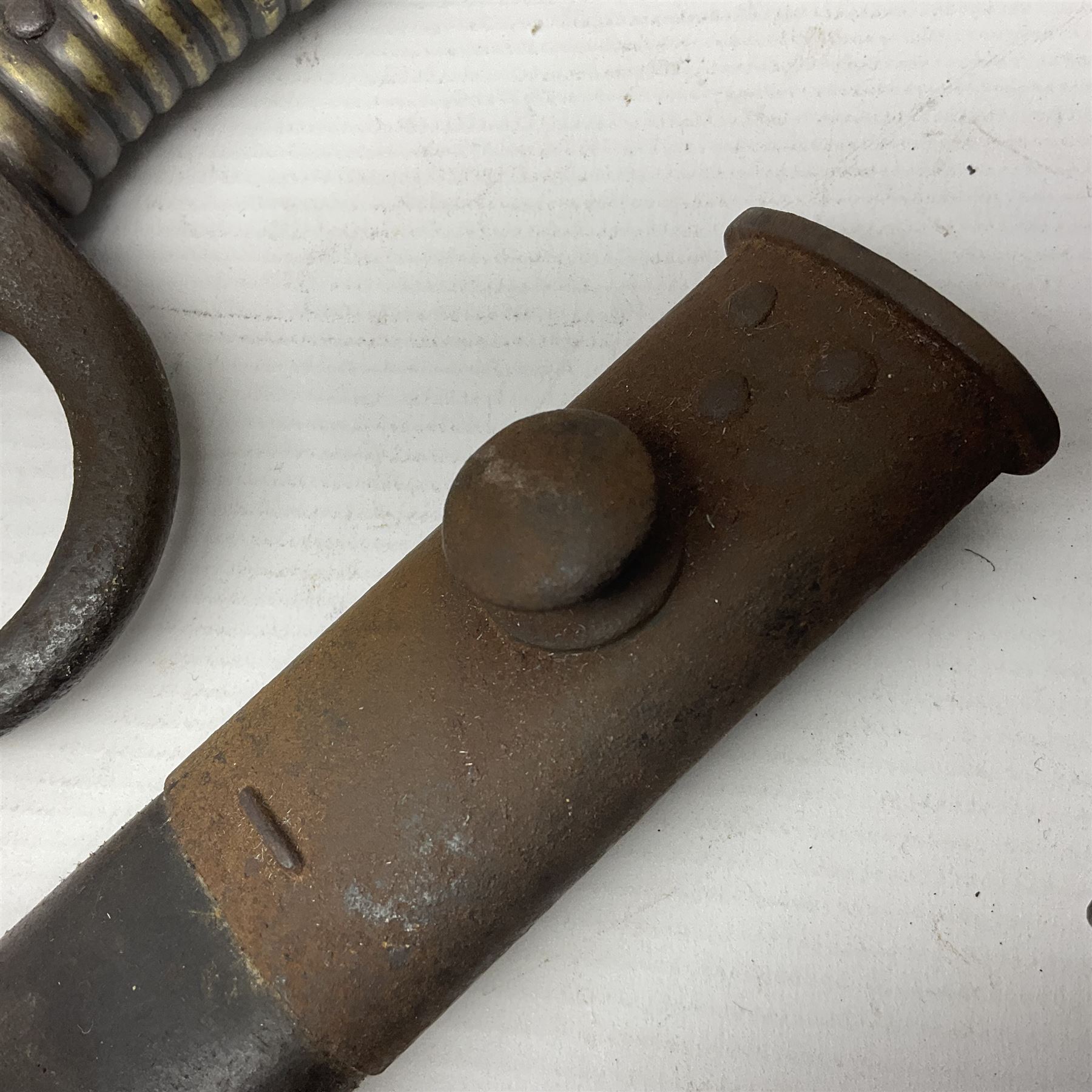 WWI Remington Pattern 1913 bayonet, the 43cm fullered blade with various marks to the ricasso including date code 11 16; in leather covered scabbard with various stamps including JWB 17 L58cm overall; and a French Model 1866 sabre bayonet (no scabbard)
