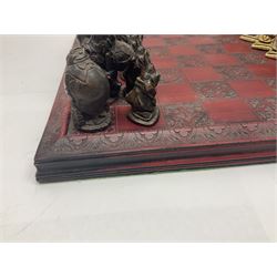 Alice in Wonderland themed chess set, with a complete set of composite figures, modelled as characters including Alice, Tweedledum and Tweedledee, the White Rabbit and the Mad Hatter, etc