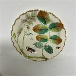 Chelsea style dish moulded as a large flower head with green stalk handle and two leaves with red anchor mark beneath, 19th century Staffordshire character jug modelled as the Duke of Wellington in military uniform, and a late Chamberlain plate