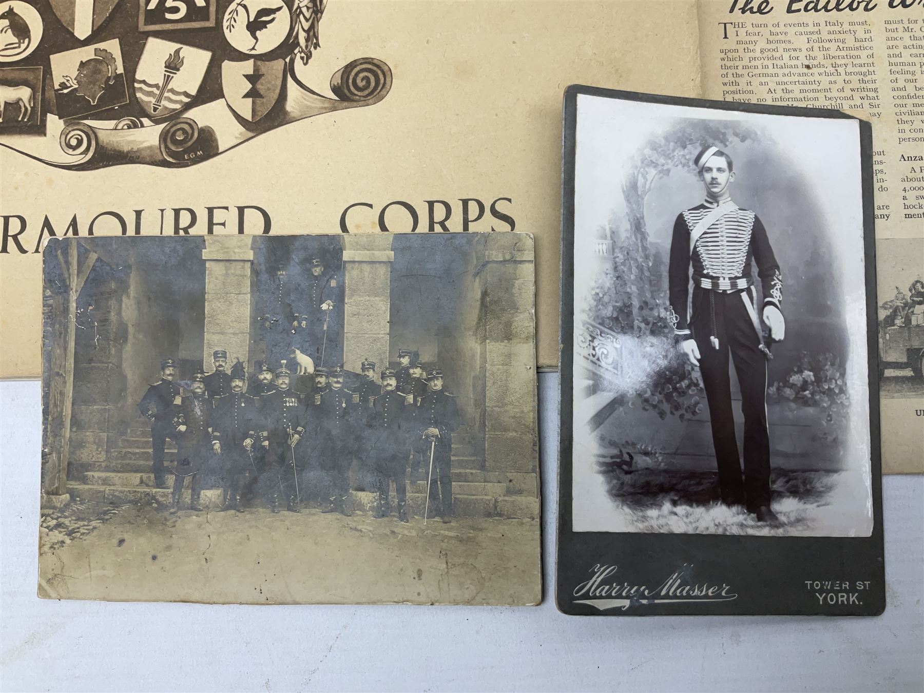 Modern album containing over sixty postcards and photographs including memorial portraits of KIA soldiers, regimental crests, comic, WW1 embroidered silk, uniforms, cap badges, camp and manoeuvre images etc; another personal photograph album of WW2 soldiers relaxing; Royal Armoured Corps booklet 'The Italian Campaign 3rd Sep. 1943 - 2nd May 1945; and other paper ephemera of military interest