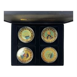 Mostly commemorative coins, medallions and fantasy coinage, including various 'Sainsbury's Makers of the Millennium' medal collection folders containing various medallions, The Toer Mint commemorative four medallion set in fitted case, Queen Elizabeth II 1982 silver proof piedfort twenty pence coin cased with certificate, various part filled The London Mint office folders etc