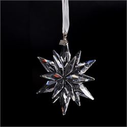 Nine Swarovski crystal snowflake Christmas ornaments, comprising years 1999-2005, 2010 and 2011, some with certificates, boxed (9)