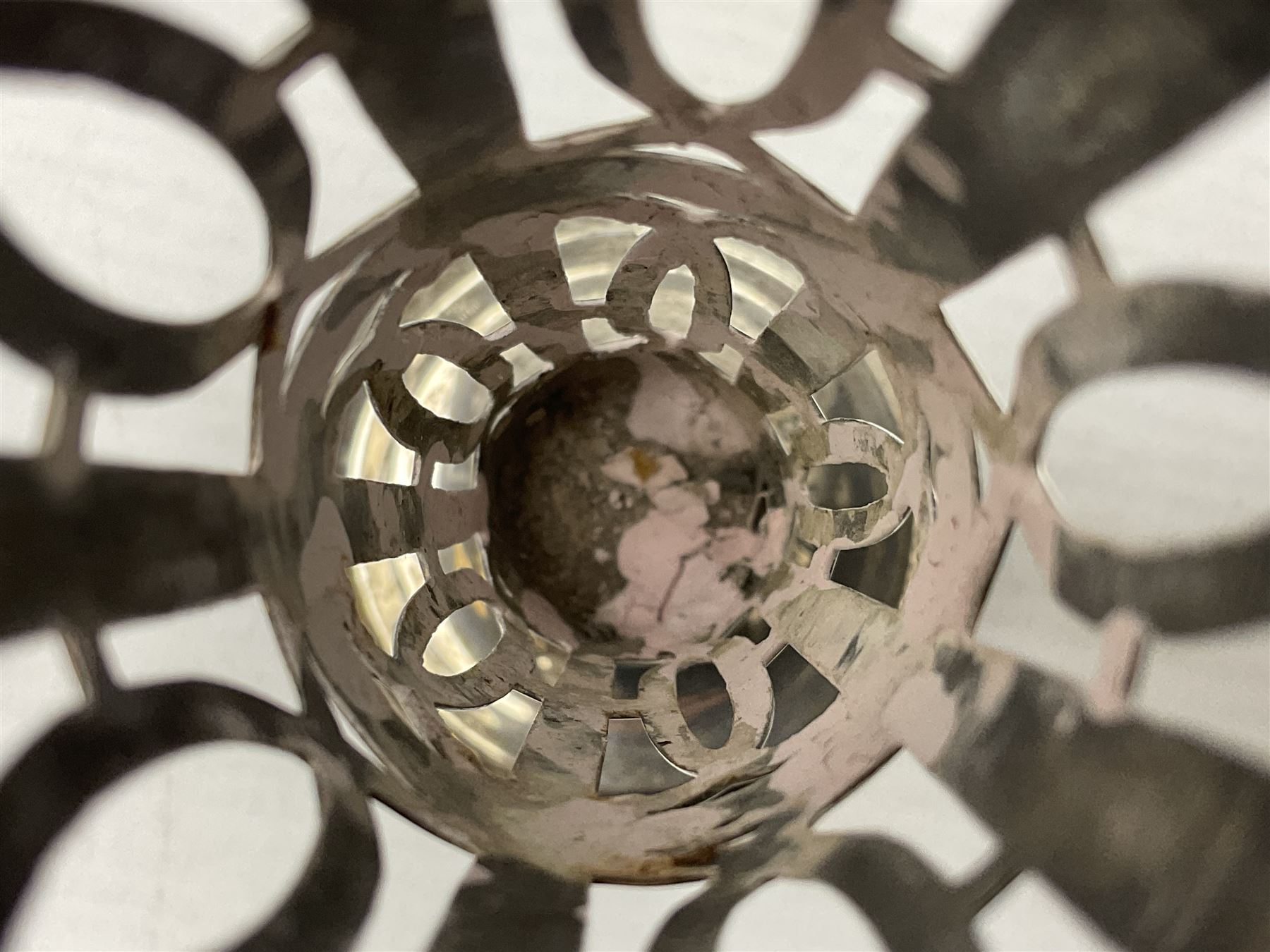 20th century silver specimen vase, of pierced trumpet form with flared rim, filled base, and blue glass liner, hallmarked Birmingham 