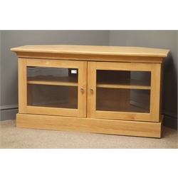  Oak finish television stand, two glazed doors enclosing one shelf, plinth base, W115cm, H61cm, D53cm  
