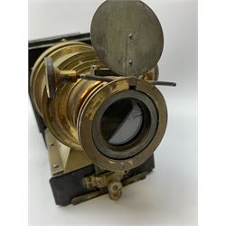 Tinplate and brass-mounted Magic Lantern, with small plaque reading 'Primus folding lantern patent 18579' and various slides