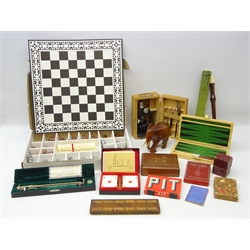  Cased Planimeter and Paul Plus microscope, Bridge set, Backgammon set, card sets, cribbage board, recorder, carved elephant, boxed limited edition Abbey Chess board & pieces and miscellanea in one box  
