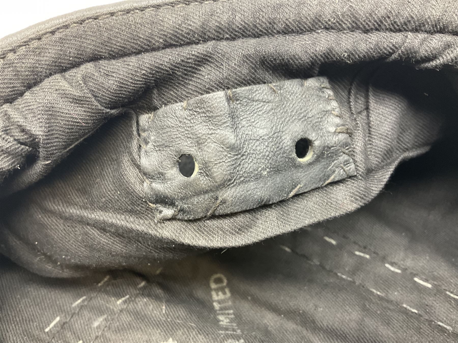 WW2 British black felt beret with Pioneer Corps cap badge, with Kangol Wear maker's mark dated 1943; and a British Army green webbing belt (2)