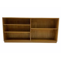 Light oak low two sectional open bookcase fitted with adjustable shelves