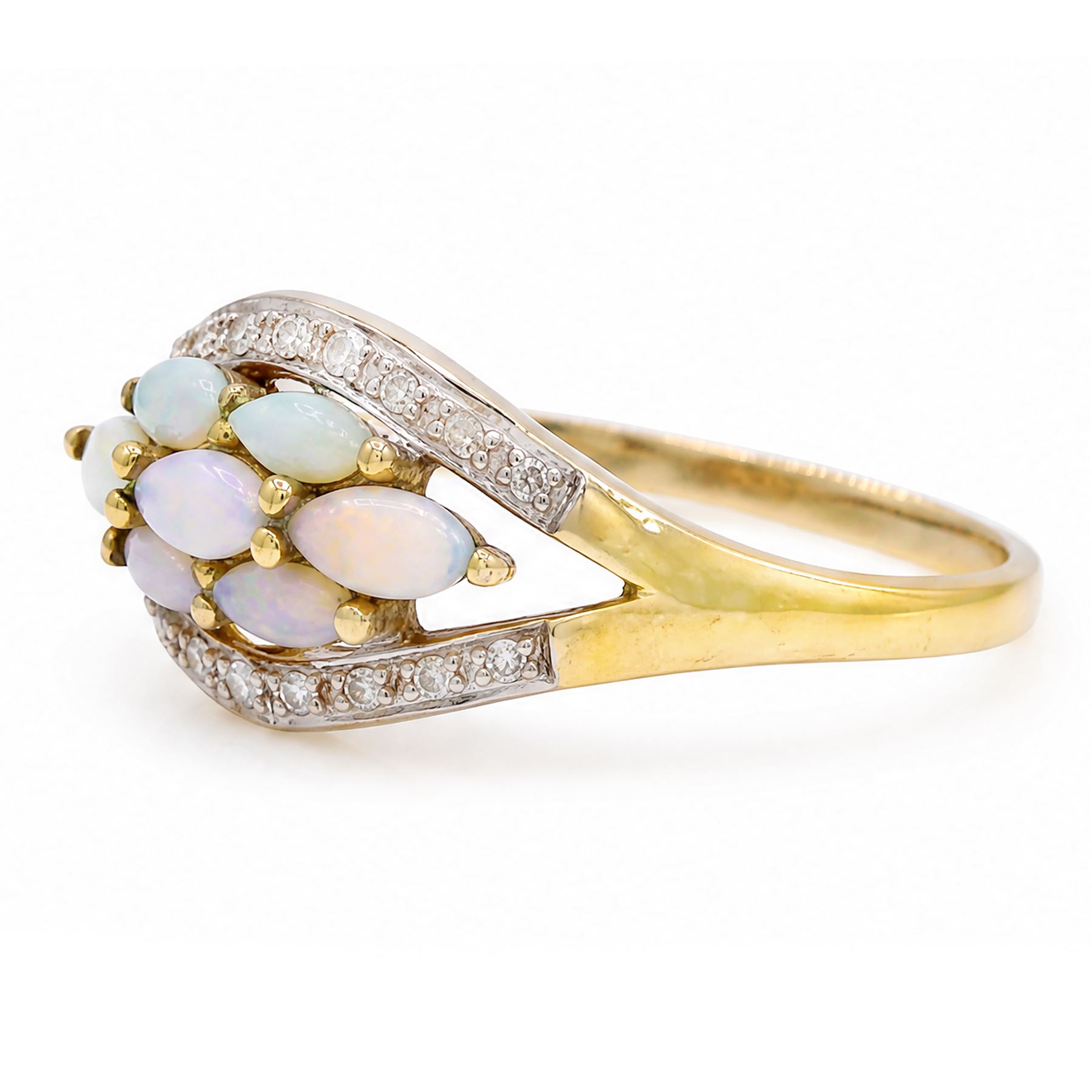 9ct gold opal and diamond cluster ring, seven marquise cut opals, surrounded by diamond chips, in a pierced design setting, Birmingham 2004