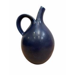 Saxbo blue glazed earthenware ewer designed by Eva Staehr Nielson (née Wilhelm), of bulbous form with strap handle and elongated spout, H19cm 