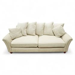 Parker Knoll - contemporary beige upholstered two seat sofa, with flared scroll arms and loose back and seat cushions, standing on stained tapered block feet