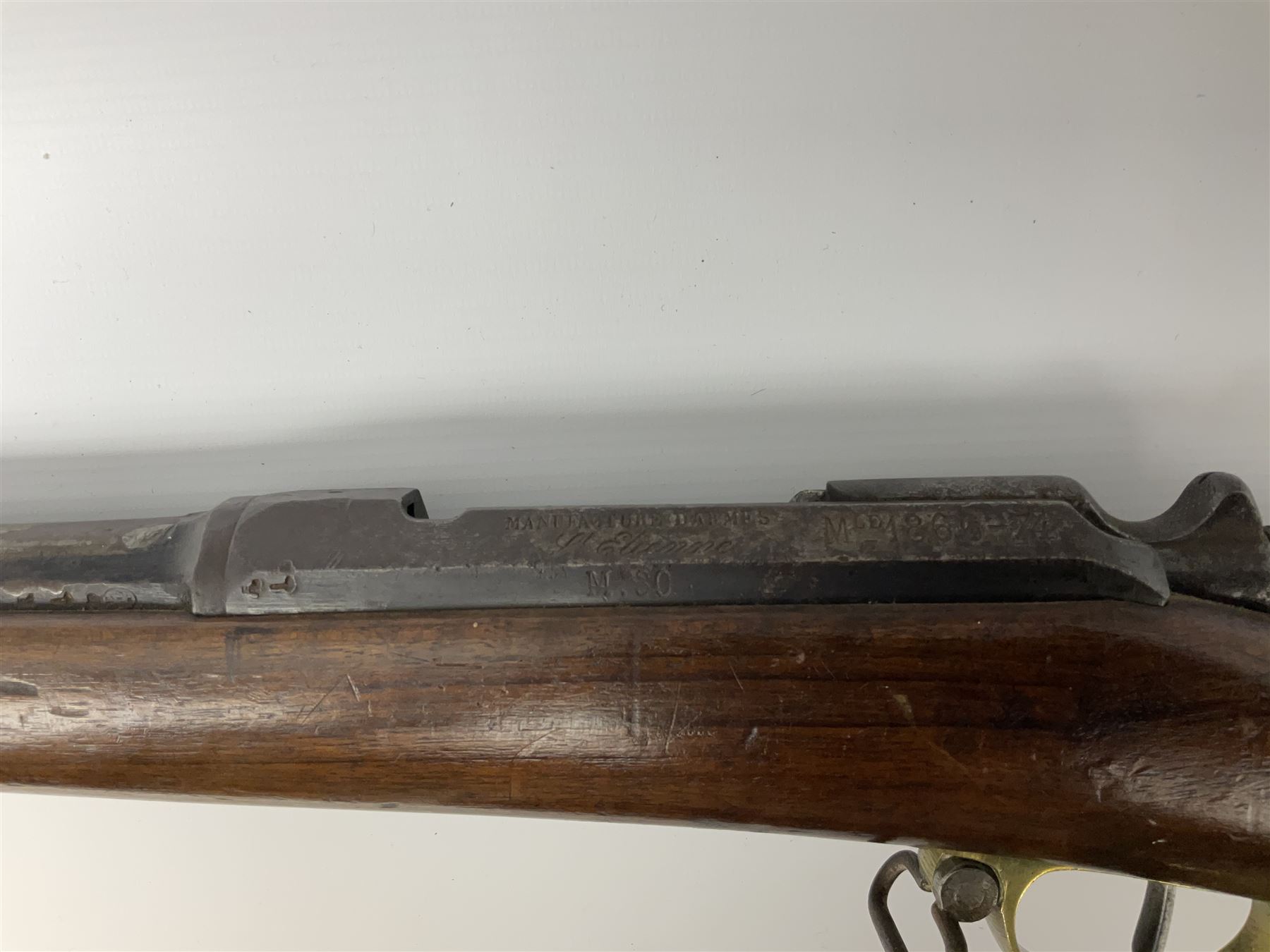 French Model 1866 Chassepot 11mm bolt-action needle fire rifle, the 70.5cm barrel stamped with various proof marks, the action inscribed 'Manufacture D'Armes St. Etienne Mle 1866-74', walnut full stock with brass mounts, stock stamped 8798, under barrel ramrod and two sling swivels L117cm