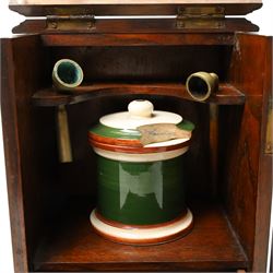 Edwardian oak smokers cabinet with carved panel door and hinged lid and a collection of various pipes and other items
