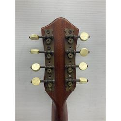 W.D. Keech banjolele pat.219720/23 with etched signature to the back; serial no.A12082 L55cm; and a restored Italian mandolin with segmented lute back; together with three music books