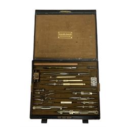 Victorian drawing instrument set by Drawing Office Supplies Ltd, housed in a black metal case, the interior containing various drawing instruments
