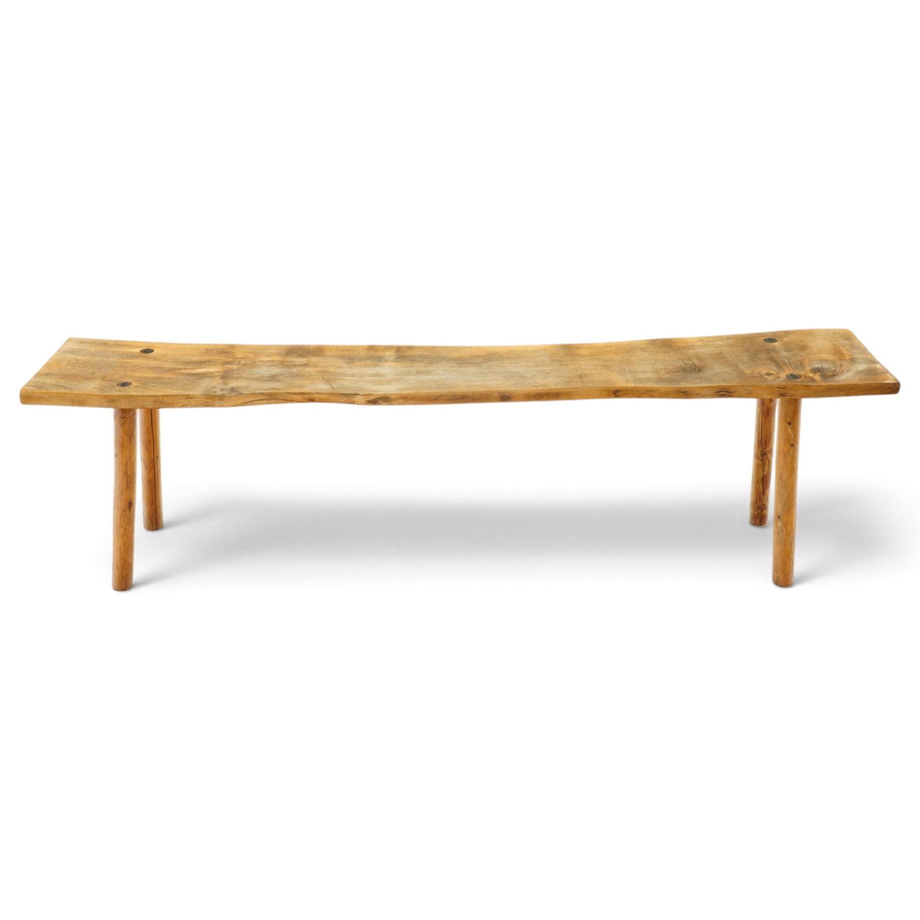 Mid-20th century live-edge bench or coffee table, raised on cylindrical supports