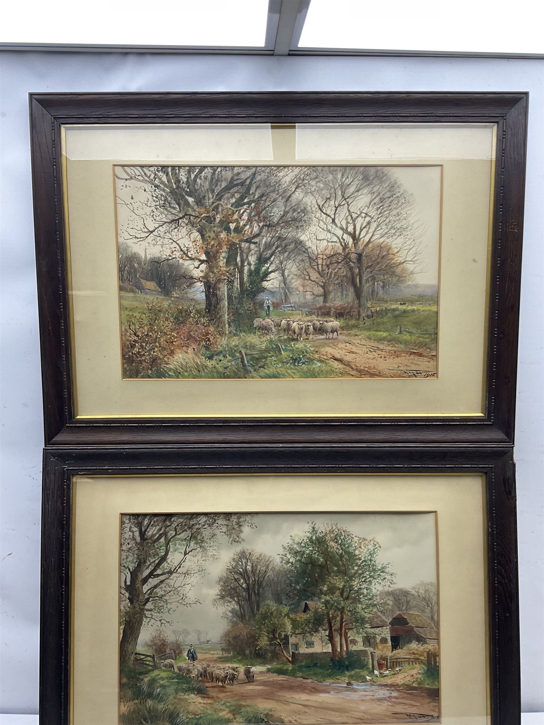 Henry Charles Fox RBA (British 1855-1929): Driving Sheep, pair watercolours with gouache signed and dated 1915, 36cm x 55cm (2)