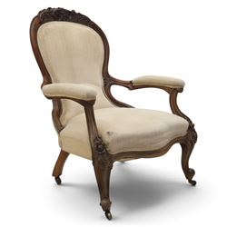 Late Victorian walnut open armchair, the carved shaped cresting rail centred by scrolls an...