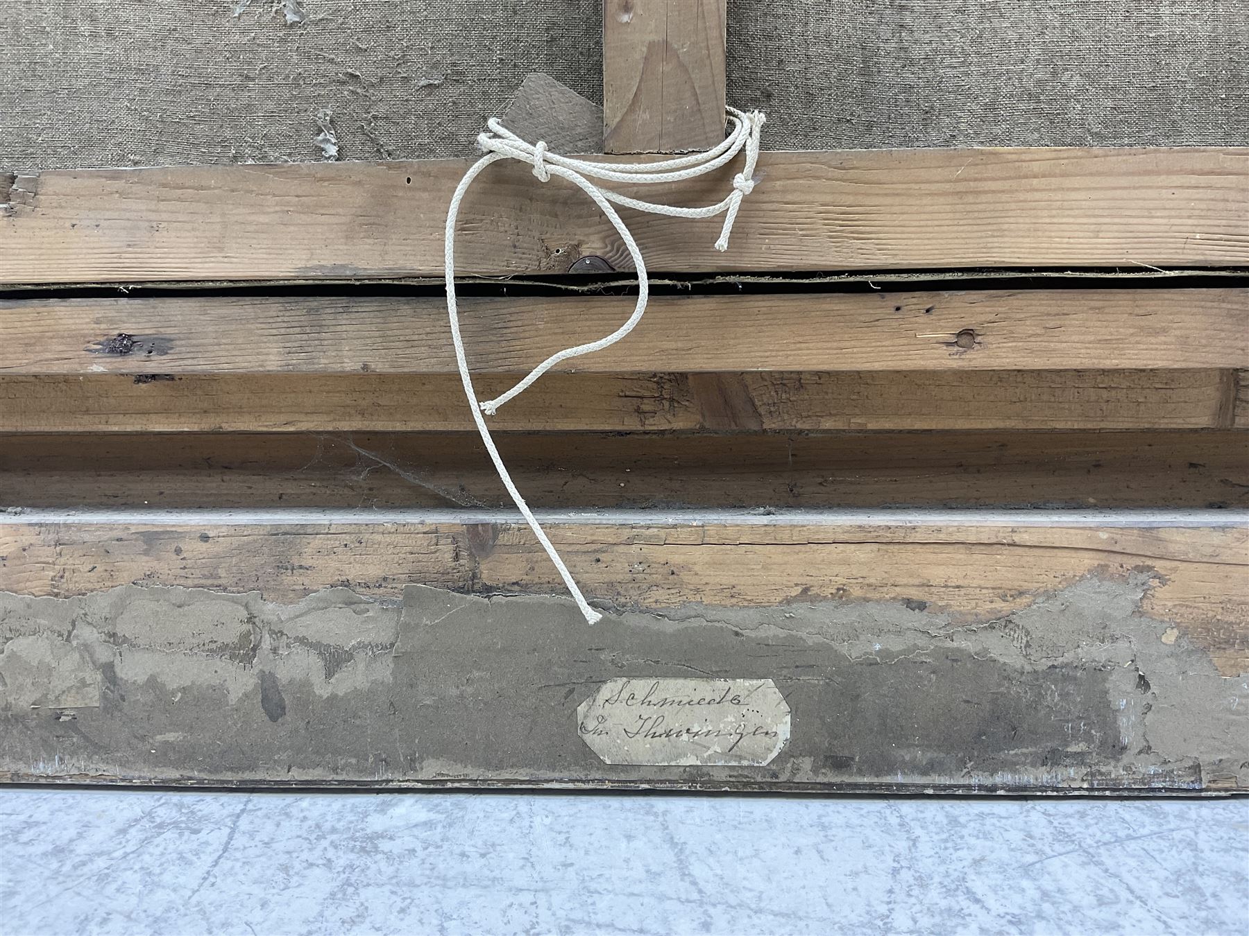 A Wilkow (Polish 19th/20th Century) Blacksmith's Workshop in a Winter Landscape, oil on canvas signed 71cm x 97cm in heavy ornate plaster gilt frame