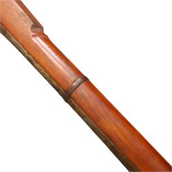  Indian matchlock jezail from the Royal Jaigarh Fort, Jaipur, the plain 69 inch barrel with flared muzzle, stamped to breech 'JPR/EXR/2/3808' on a full wooden stock, overall length 239cm, together with certificate of authenticity on Rajmahal Palace Office headed paper, dated 11th March 1978