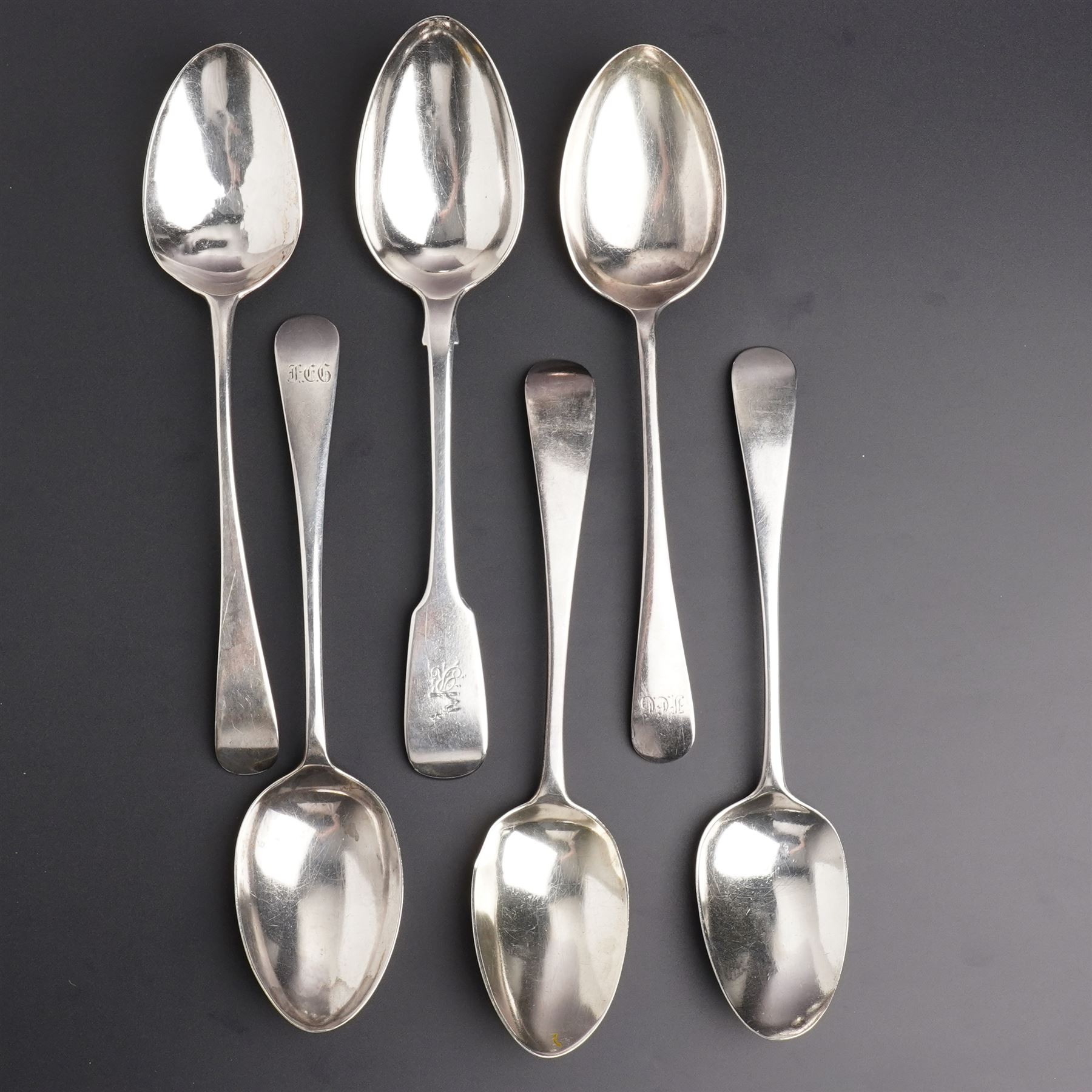 Pair of silver table spoons engraved with initials,  Sheffield 1926 Maker Pinder Bros. George III table spoon London 1803 and three other 19th century table spoons, various dates and makers