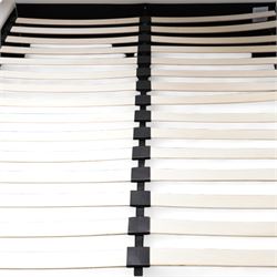Contemporary upholstered double size bed frame, plain rectangular headboard and footboard upholstered in cream faux leather, sprung beech slatted base raised on concealed feet