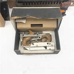 Various hand tools comprising Stanley combination plane, a button press, router jig and a Hilka 6