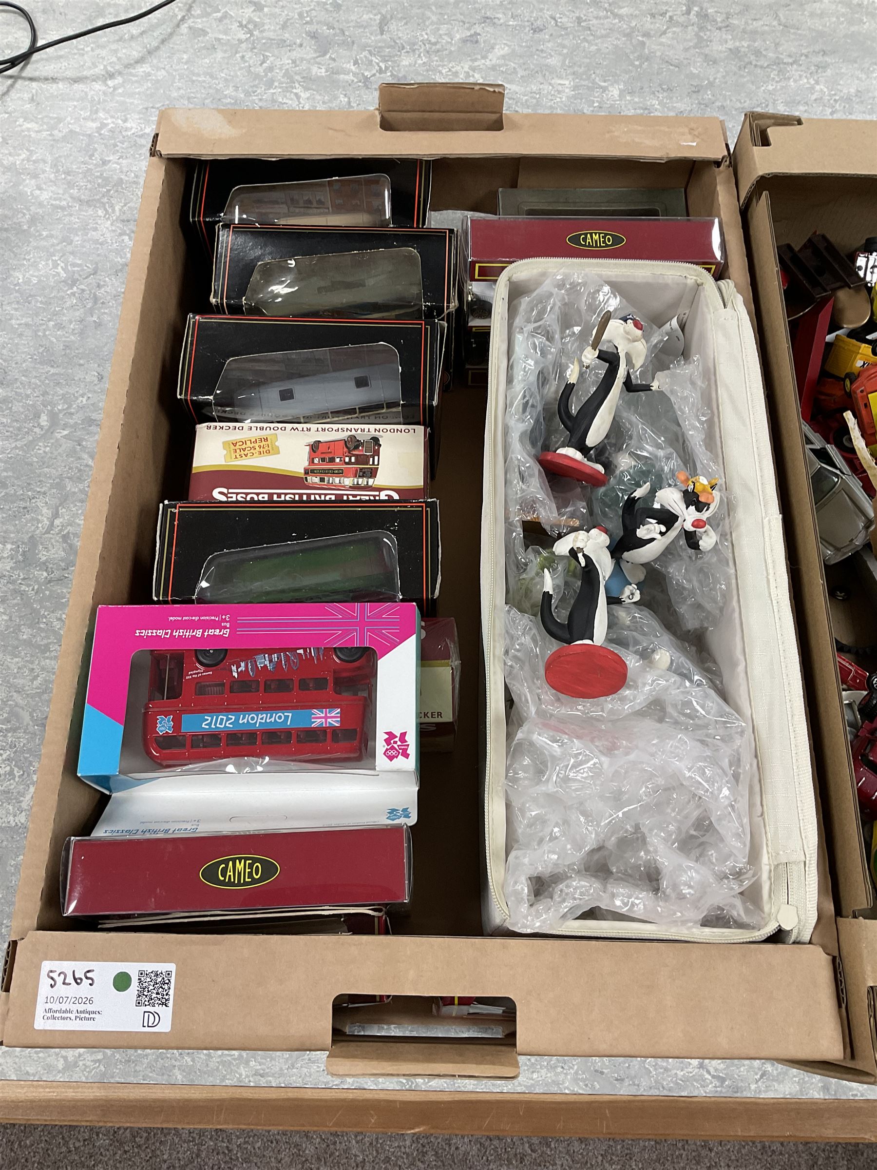 Large collection of toy vehicles including Great British Classics London 2012 Olympics Bus, Matchbox Battle Kings K105 Hover Raider and Dinky Toys Joe's Car 102, together with a collection of Disney figurine ornaments, variously boxed
