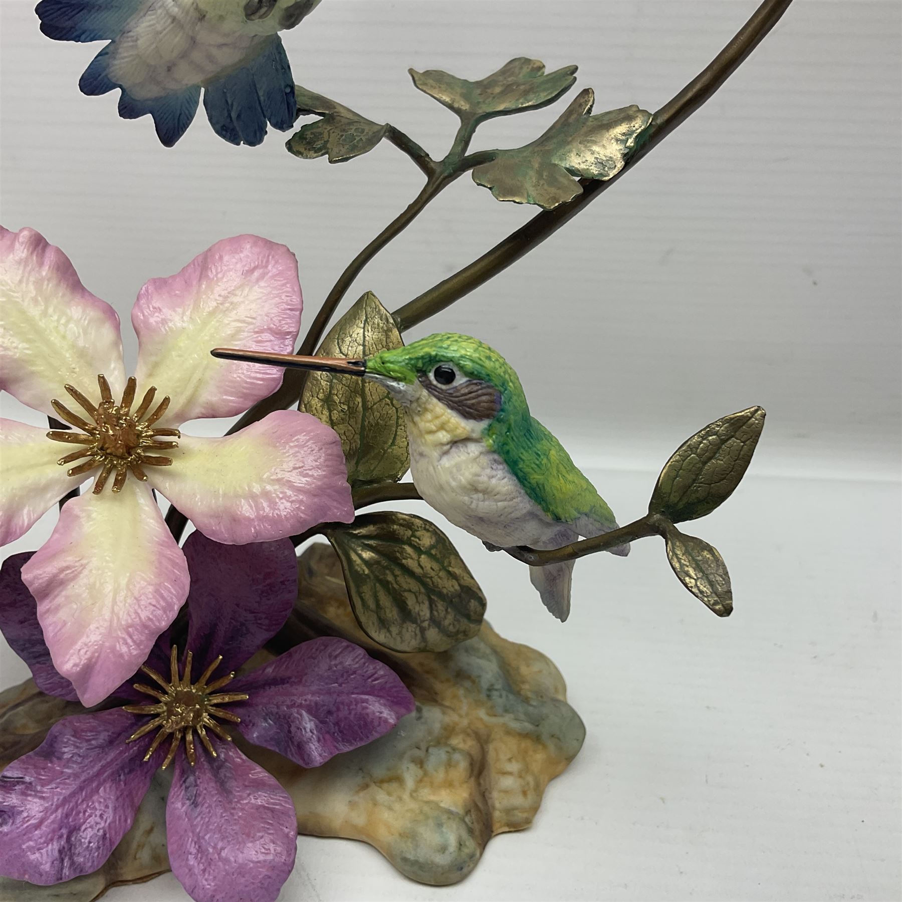 Franklin Mint House of Faberge, four humming bird figure groups, comprising Flight of Fancy, Beauty in Bloom, Splendor in the garden and The Enriched Garden, largest H35cm