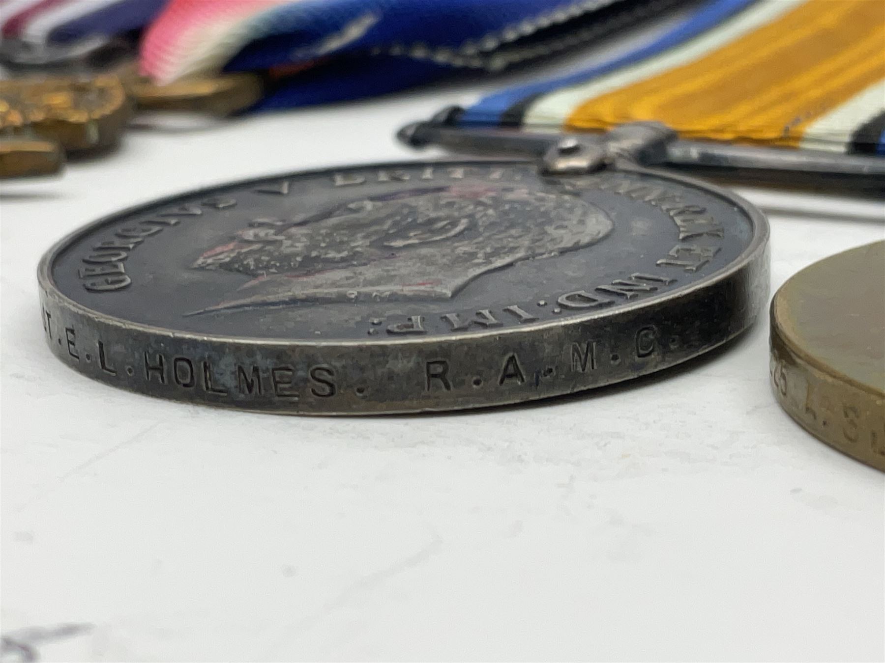 WW1 Military Medal KIA group of four comprising MM, British War Medal, 1914-15 Star and Victory Medal awarded to 32225 Pte. (later A.Sjt.) E.L. Holmes R.A.M.C., the MM inscribed 28F/A R.A.M.C.; all with ribbons; together with photocopied research material including newspaper article with presentation photograph, CWGC certificate,  London Gazette entry etc