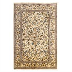 Central Persian Kashan hand-knotted carpet, ivory ground with central stepped floral medal...