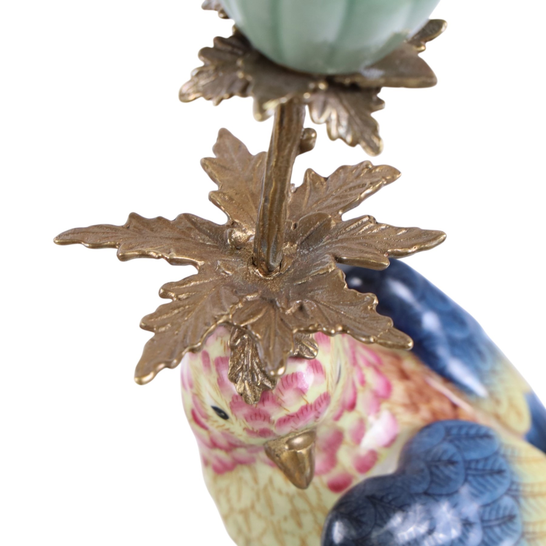 Pair candlesticks, modelled as parrots, upon urn shaped mounts with gilt detail, H48cm