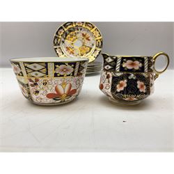 Royal Crown Derby Imari 2451 pattern part tea set comprising six cups and saucers, six dessert plates, milk jug and open sucrier